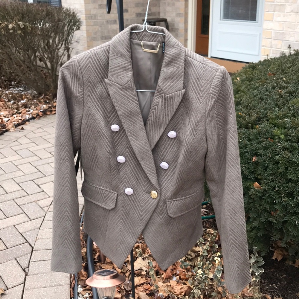 Double breasted blazer.